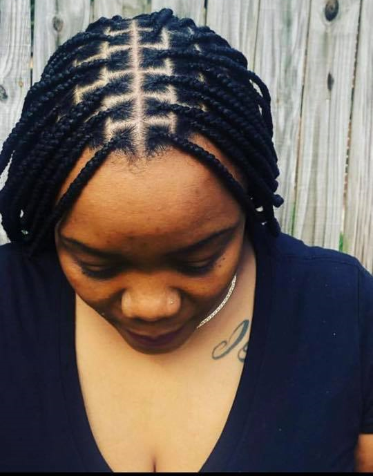 Box braids with zigzag parting